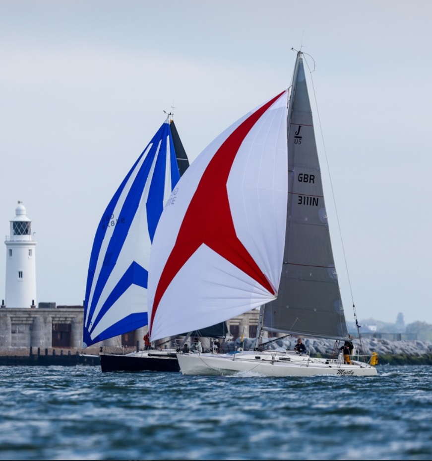 With spinnaker hoisted, Mostly Harmless worked back through the fleet